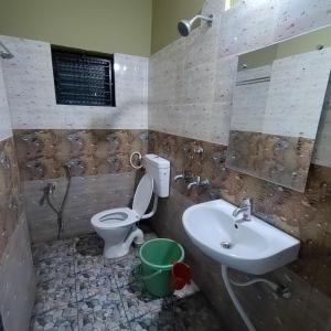 A bathroom at Shri Saimata Residency
