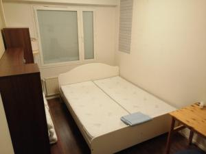 Postel nebo postele na pokoji v ubytování Laajavuoren majapaikka — Condo in Laajavuori