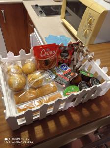 a basket filled with bread and other food on a counter at Casa Carrasco in Algar