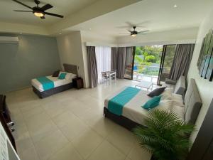 Кровать или кровати в номере Hotel Naoz