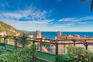 a view of the ocean from a building at Frontière Monaco, Terrasse, Vue Mer, Parking - AB in Beausoleil