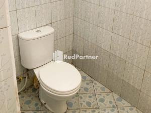 Koupelna v ubytování Taman Ayu Homestay Munduk Mitra RedDoorz