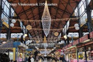 a shopping mall with a chandelier hanging from the ceiling at keleti apartment city center big flat bedroom private use in Budapest