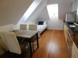Kuchyň nebo kuchyňský kout v ubytování Apartmánový Penzión Bojnice