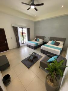 Кровать или кровати в номере Hotel Naoz