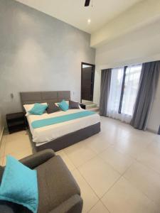 Кровать или кровати в номере Hotel Naoz