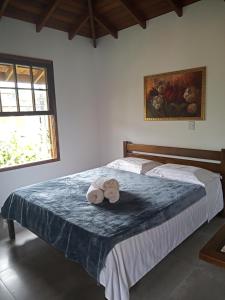 Postel nebo postele na pokoji v ubytování Pousada Cipó Paraty