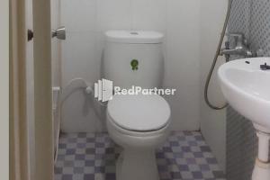 Koupelna v ubytování Guest House Anak Raja Pangkalan Bun Syariah Mitra RedDoorz + 11 fotografií