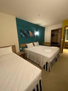 Voodi või voodid majutusasutuse Apartamento no Solar das Águas Resort em Olímpia - SP toas