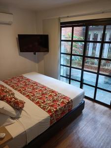 Krevet ili kreveti u jedinici u okviru objekta Hotel Poma Rosa