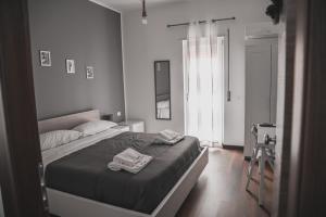 Ein Bett oder Betten in einem Zimmer der Unterkunft La Casina B&B