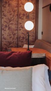 Postel nebo postele na pokoji v ubytování JovA Hotel Boutique