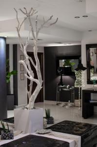 Posedenie v ubytovaní Trokadero Boutique Hotel