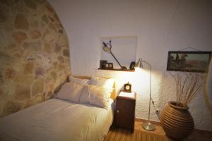 Posteľ alebo postele v izbe v ubytovaní St. John Traditional House