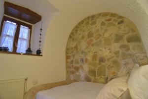 Posteľ alebo postele v izbe v ubytovaní St. John Traditional House