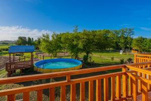 Pemandangan kolam renang di Hotel de campo Haras Los Abuelos atau berdekatan