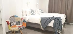 Posteľ alebo postele v izbe v ubytovaní HD Mogán Canal Apartments