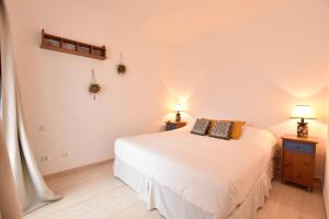 Postel nebo postele na pokoji v ubytování Casa Los Alisios Lanzarote + 23 fotografií