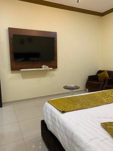 TV a/nebo společenská místnost v ubytování فندق ليالي العرب + 6 fotografií