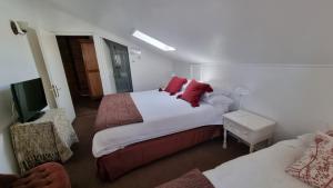 Postel nebo postele na pokoji v ubytování Chocolate Manor House Hotel Boutique
