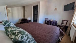 Postel nebo postele na pokoji v ubytování Chocolate Manor House Hotel Boutique
