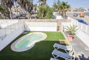 Zdjęcie z galerii obiektu Galera Beach Boutique Art Villas with Private Pools, Free Wifi & BBQ, Corralejo by Amazzzing Travel w Corralejo