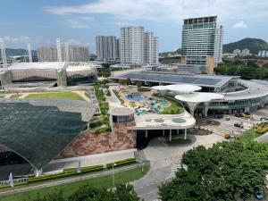 a building with a water park in a city at 4R3B Cozy, Spice Arena/PISA View Houze B.Lepas in Bayan Lepas