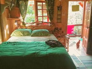 Voodi või voodid majutusasutuse Treehouse Holidays-Garden View toas