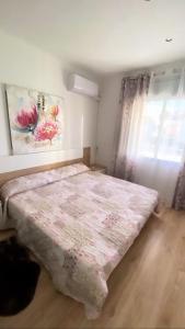 Posteľ alebo postele v izbe v ubytovaní Apartsalou Tati