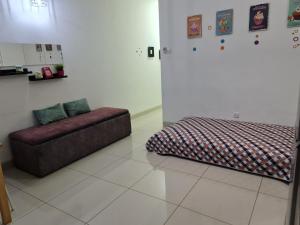Katil atau katil-katil dalam bilik di D'Kroll Vega Residensi Cyberjaya 1 Bedroom Suite