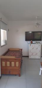 En eller flere senge i et værelse på Calle uno