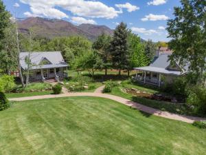 an aerial view of a house with a yard at Apple Orchard Inn in Durango