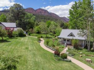 an aerial view of a yard with a house at Apple Orchard Inn in Durango