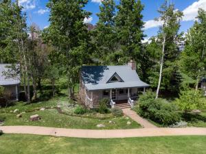 an aerial view of a house with a yard at Apple Orchard Inn in Durango