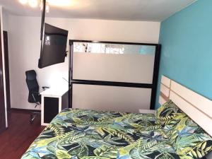 Кровать или кровати в номере Alójate en Vigo! Casita bien equipada