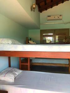 Ένα ή περισσότερα κρεβάτια σε δωμάτιο στο La Casa de Pedro Hostel