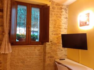 TV a/nebo společenská místnost v ubytování B&B San Francesco