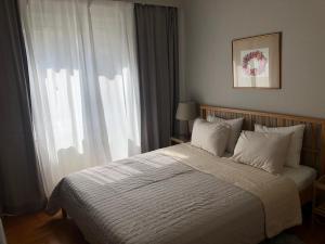 Postel nebo postele na pokoji v ubytování Pied-à-terre