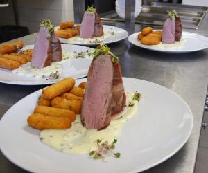 a group of plates of food on a table at Hotel Lužnice in Planá nad Lužnicí