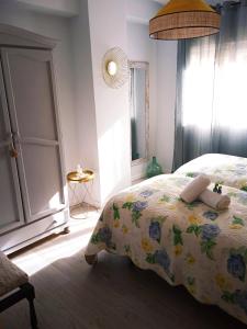 Una cama o camas en una habitación de Hipica Home Granada Center