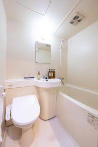 Kylpyhuone majoituspaikassa AMANEK Inn Beppu