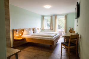 Ліжко або ліжка в номері Gasthof Dreiländereck