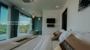 TV a/nebo společenská místnost v ubytování Caligo Resort