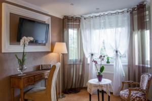 Telewizja i/lub zestaw kina domowego w obiekcie Villa Siesta