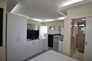 Kjøkken eller kjøkkenkrok på Seaflats - Meireles - Villa Costeira