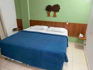 Ένα ή περισσότερα κρεβάτια σε δωμάτιο στο Flat à beira-mar de Cabo Branco +24 φωτογραφίες