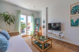 Et tv og/eller underholdning på Apartamento con Jardin Privado - SimplyTarifa