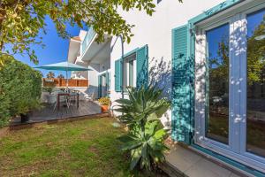 En have udenfor Apartamento con Jardin Privado - SimplyTarifa