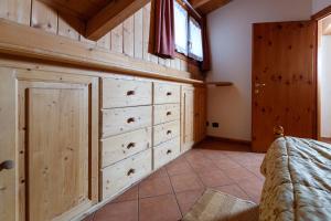 A bed or beds in a room at Hotel Villa Rina