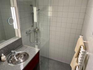 Ett badrum på Gasthof Meindl